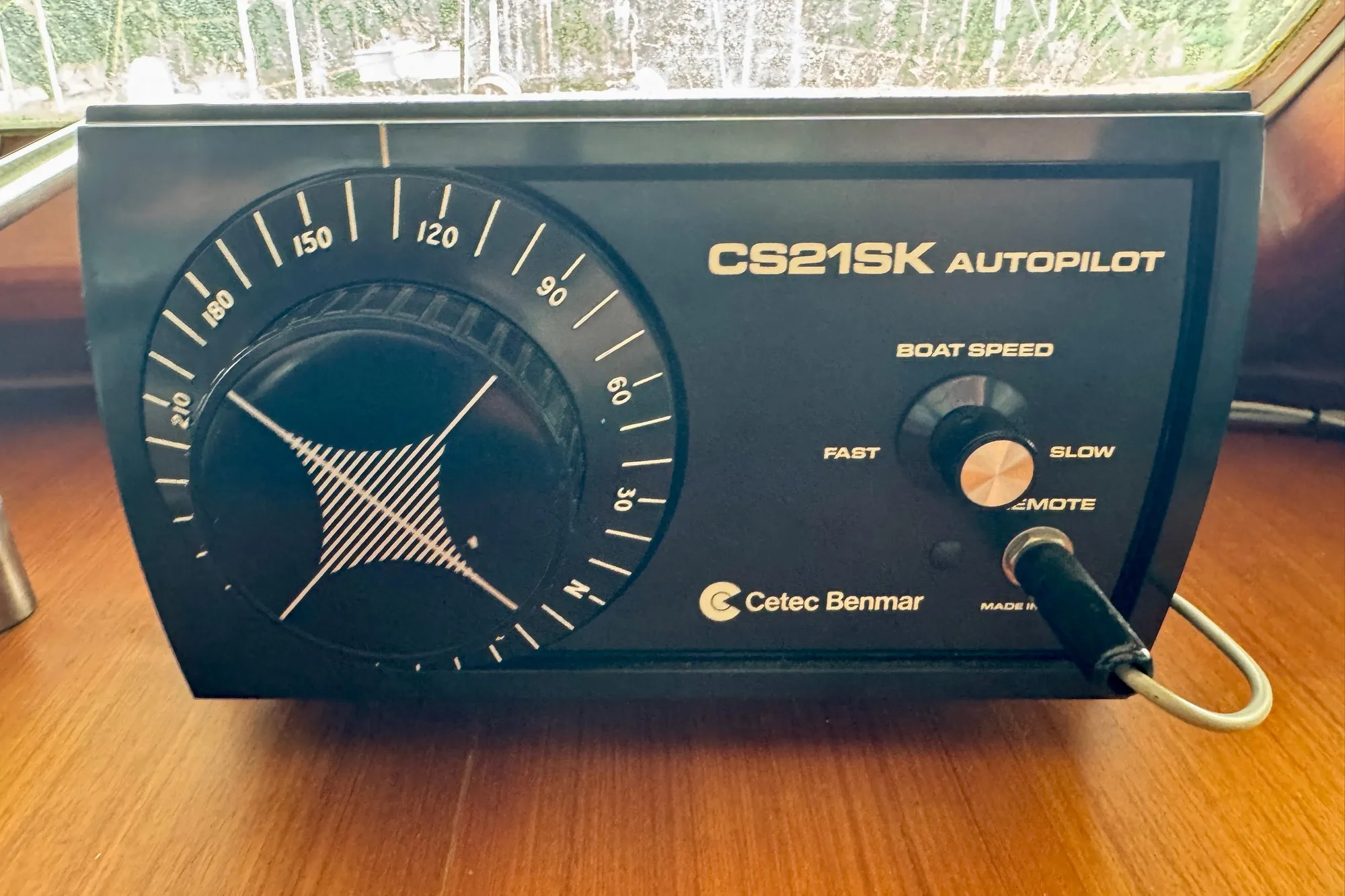 1982 Tung Hwa Seahorse CS21SK autopilot control panel on wooden surface.