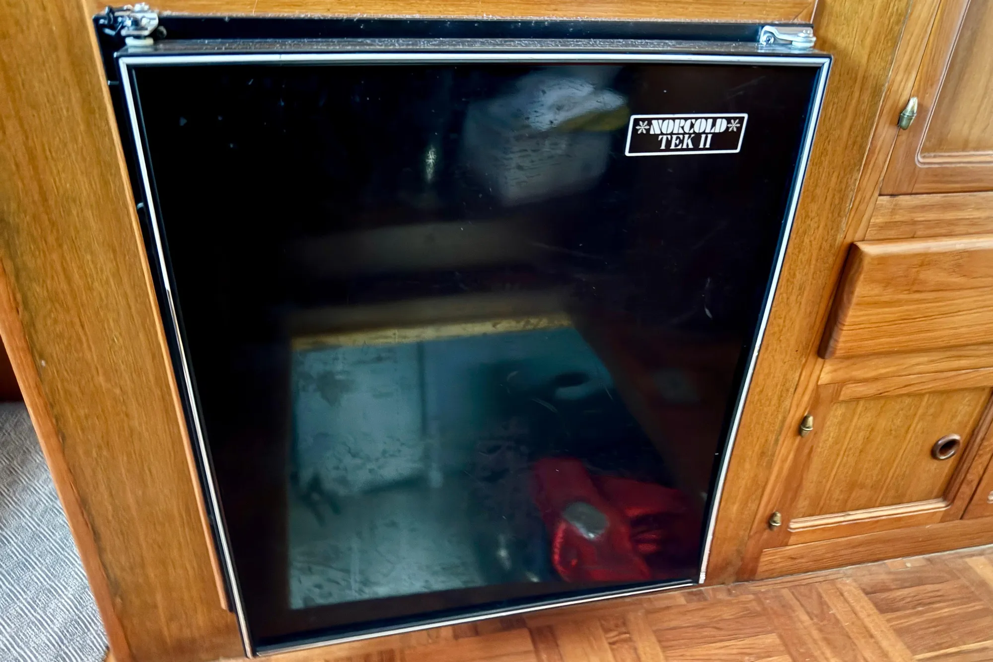 Norcold Tek II refrigerator in 1982 Tung Hwa Seahorse boat interior.