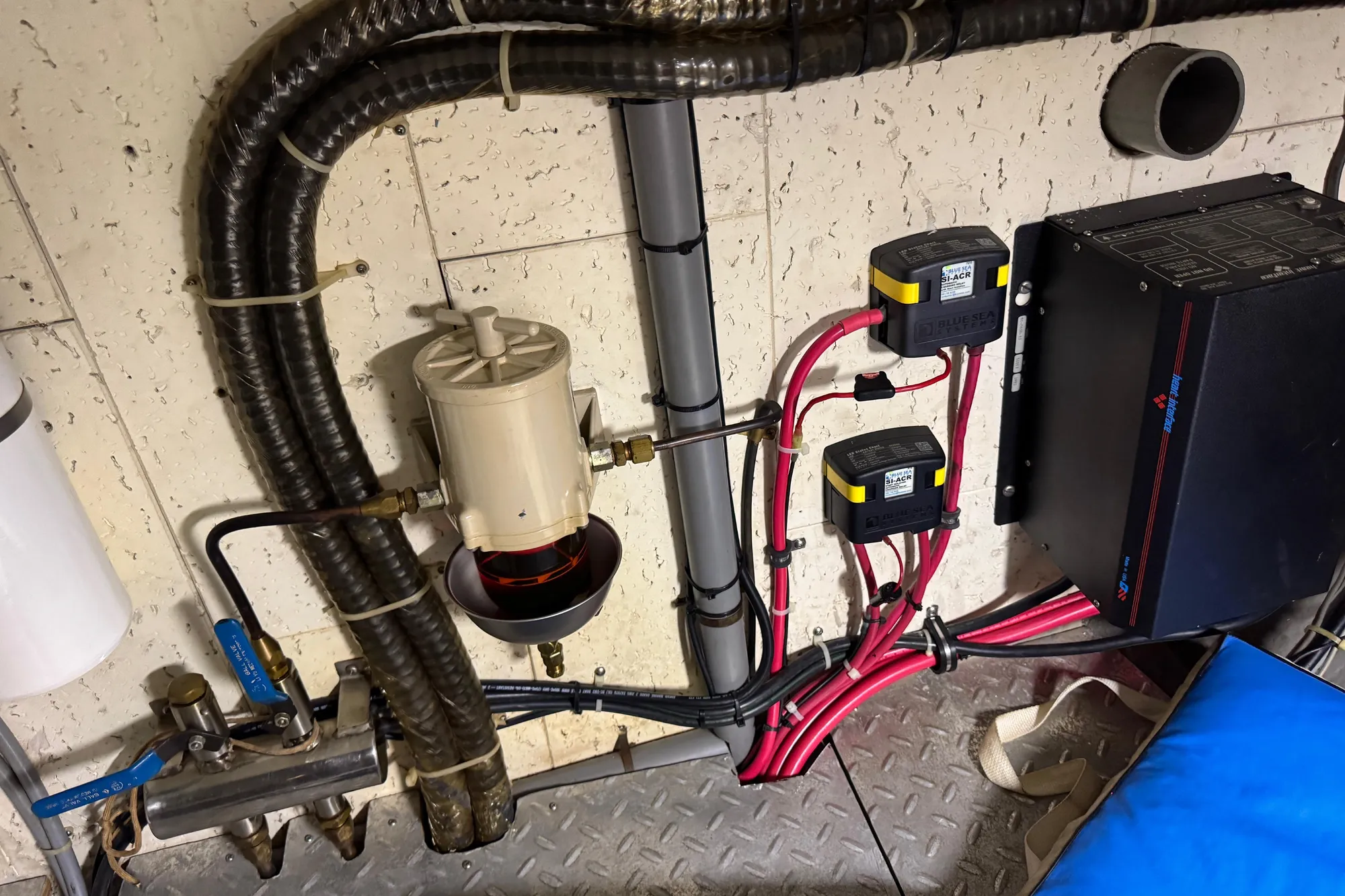 Engine room wiring and components of a 1982 Tung Hwa Seahorse boat.