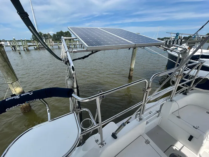 Dream Weaver Yacht Photos Pics Catalina 350 sailboat with solar panel, docked at marina, 2003 model.