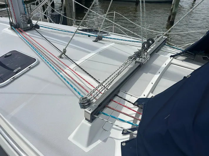 Dream Weaver Yacht Photos Pics Deck of a 2003 Catalina 350 sailboat with colorful rigging lines.