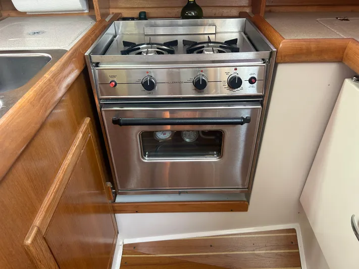 Dream Weaver Yacht Photos Pics Stainless steel stove and oven in 2003 Catalina 350 yacht kitchen.
