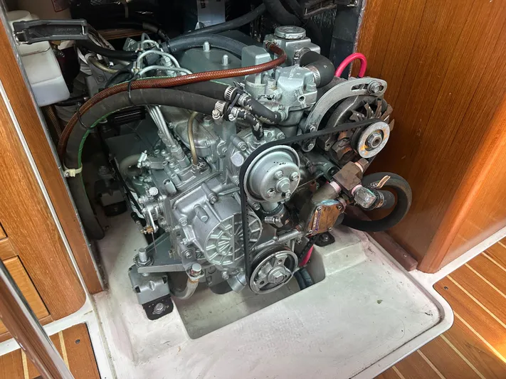 Dream Weaver Yacht Photos Pics Engine compartment of a 2003 Catalina 350 sailboat, showcasing detailed mechanical components.