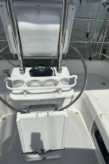 Dream Weaver Yacht Photos Pics Steering wheel and compass on a 2003 Catalina 350 sailboat.
