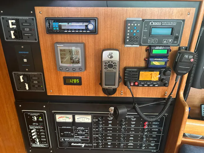 Dream Weaver Yacht Photos Pics Control panel of a 2003 Catalina 350 yacht with navigation and communication equipment.