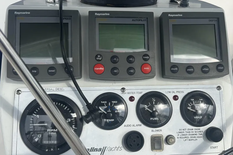Dream Weaver Yacht Photos Pics Control panel of a 2003 Catalina 350 yacht with Raymarine displays and gauges.