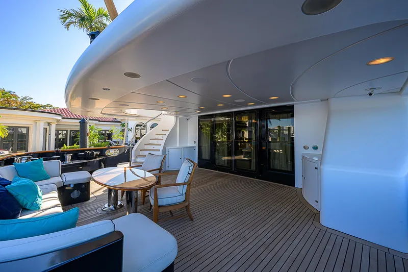 Seascape V Yacht Photos Pics Luxury deck of 2005 Benetti Vision 145 yacht with elegant seating and modern design.