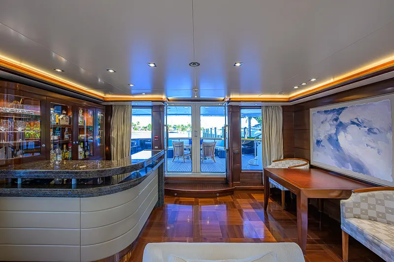 Seascape V Yacht Photos Pics Luxurious interior of 2005 Benetti Vision 145 yacht with elegant bar and seating area.