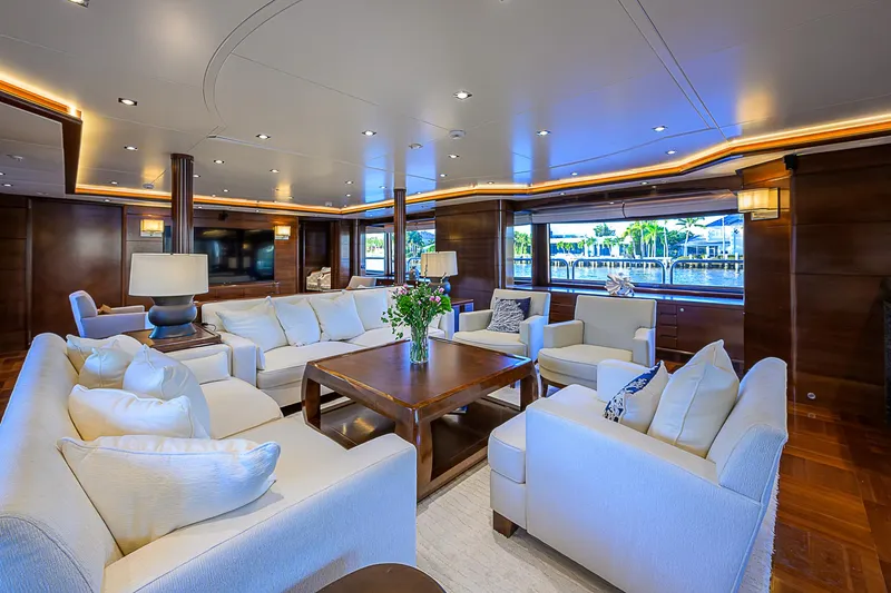 Seascape V Yacht Photos Pics Luxurious interior of 2005 Benetti Vision 145 yacht with elegant seating and wooden accents.