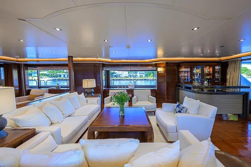 Seascape V Yacht Photos Pics Luxurious interior of 2005 Benetti Vision 145 yacht with elegant seating and wooden accents.