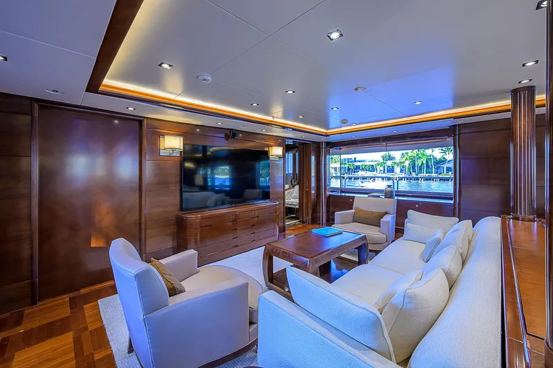 Seascape V Yacht Photos Pics Luxurious interior of 2005 Benetti Vision 145 yacht with elegant seating and wood paneling.