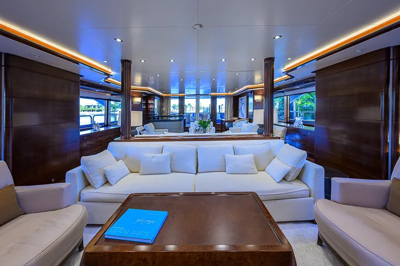 Seascape V Yacht Photos Pics Luxurious interior of 2005 Benetti Vision 145 yacht with elegant seating and wooden accents.