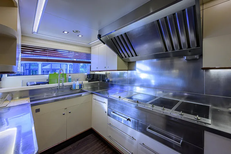 Seascape V Yacht Photos Pics Modern kitchen interior on 2005 Benetti Vision 145 yacht, featuring stainless steel appliances and sleek design.