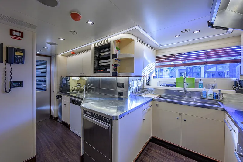 Seascape V Yacht Photos Pics Luxurious kitchen interior on a 2005 Benetti Vision 145 yacht, featuring modern appliances.