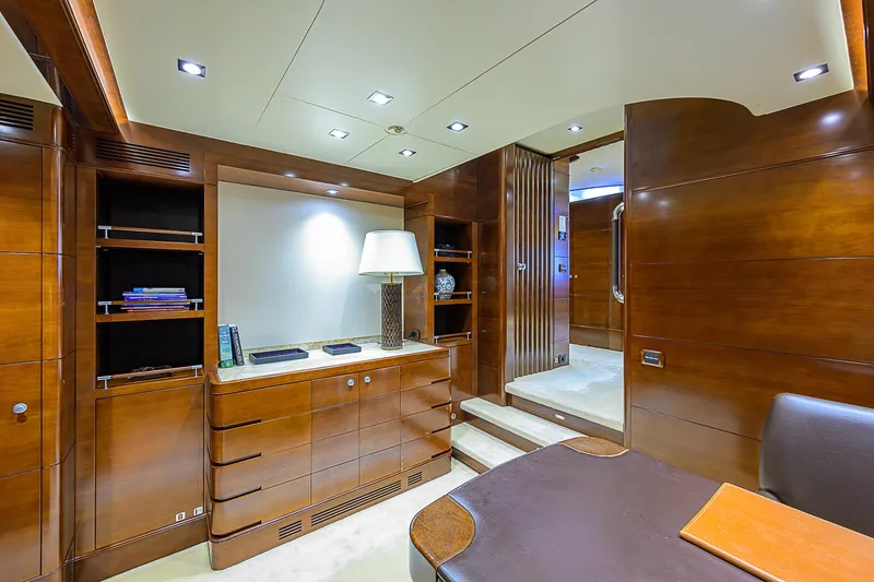Seascape V Yacht Photos Pics Luxurious interior of 2005 Benetti Vision 145 yacht with elegant wood paneling and modern furnishings.