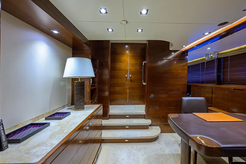 Seascape V Yacht Photos Pics Luxurious interior of 2005 Benetti Vision 145 yacht with elegant wood finishes and modern lighting.