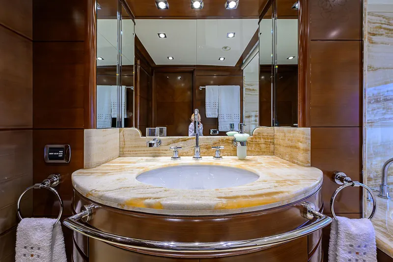 Seascape V Yacht Photos Pics Luxurious bathroom on Benetti Vision 145 yacht, featuring elegant marble sink and mirrored walls, 2005 model.