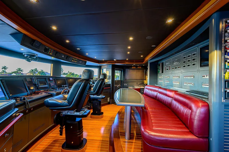 Seascape V Yacht Photos Pics Luxurious interior of 2005 Benetti Vision 145 yacht with leather seating and advanced control panels.