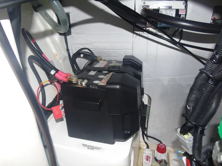 Tafika Yacht Photos Pics Battery compartment of 2024 Leopard 50 yacht with wiring and components.