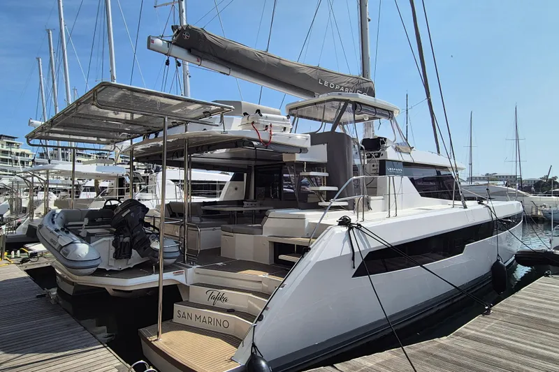 Tafika Yacht Photos Pics 2024 Leopard 50 yacht docked at marina, featuring sleek design and modern amenities.