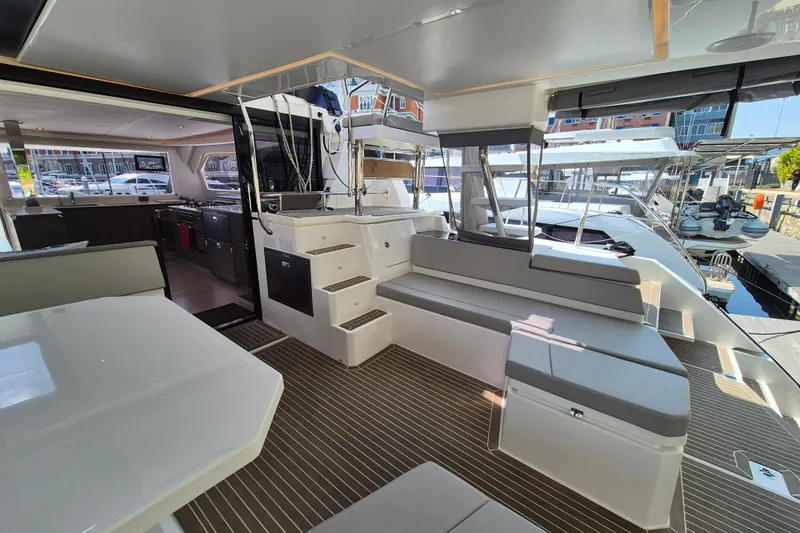 Tafika Yacht Photos Pics 2024 Leopard 50 yacht interior with modern seating and sleek design.