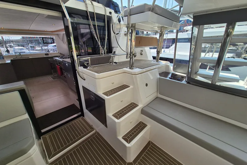 Tafika Yacht Photos Pics Interior view of 2024 Leopard 50 yacht, featuring modern seating and sleek design elements.