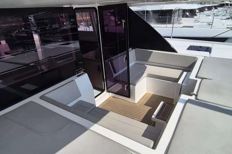 Tafika Yacht Photos Pics 2024 Leopard 50 yacht interior with sleek seating and modern design elements.