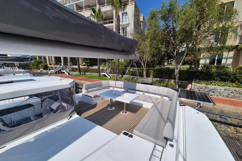 Tafika Yacht Photos Pics 2024 Leopard 50 yacht with spacious deck seating and modern design.