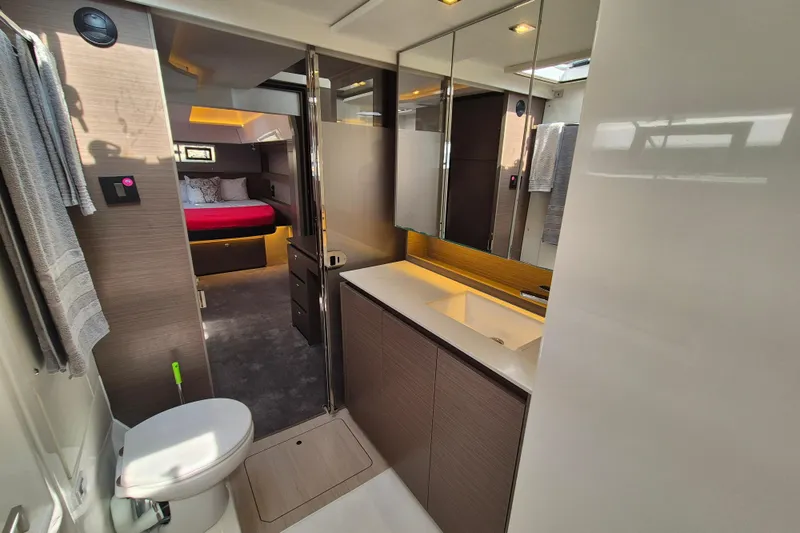 Tafika Yacht Photos Pics Luxurious bathroom and bedroom interior of 2024 Leopard 50 yacht.
