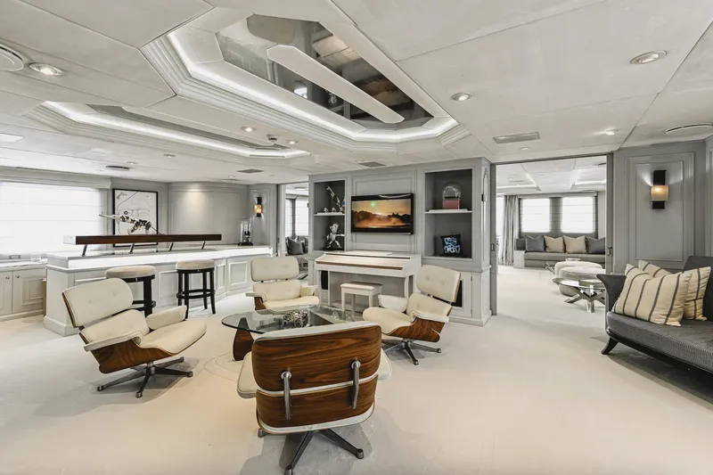 Chakra Yacht Photos Pics Luxurious yacht interior with modern furniture, elegant decor, and ambient lighting, Devonport 86m, 1963.