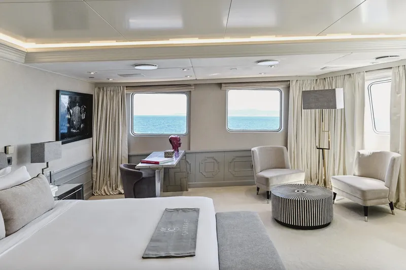 Chakra Yacht Photos Pics Luxurious yacht interior with ocean view, featuring elegant furnishings and modern decor.