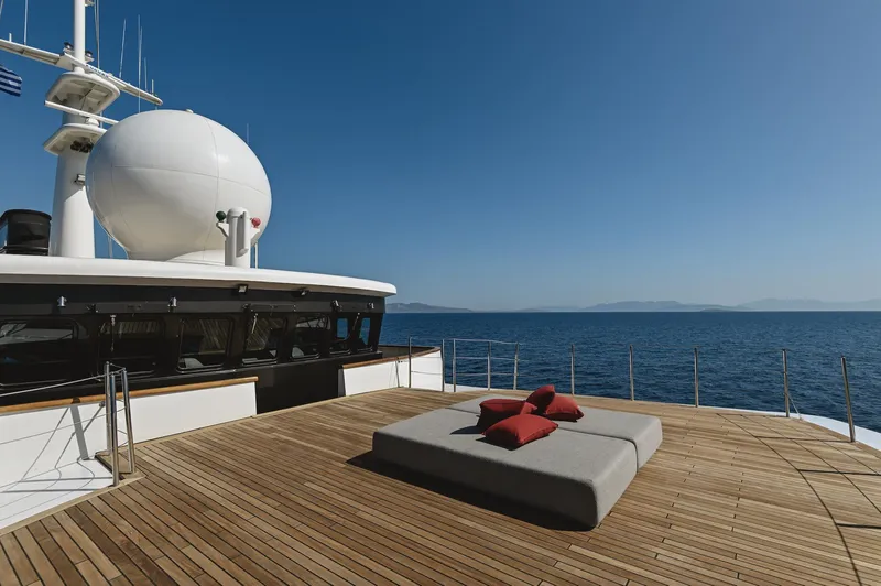 Chakra Yacht Photos Pics Luxurious Devonport 86m yacht deck with cushions, ocean view, clear blue sky, built in 1963.