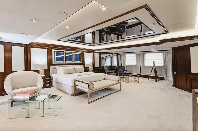 Chakra Yacht Photos Pics Luxurious yacht bedroom with elegant furnishings, modern decor, and ample natural light, Devonport 86m, 1963.