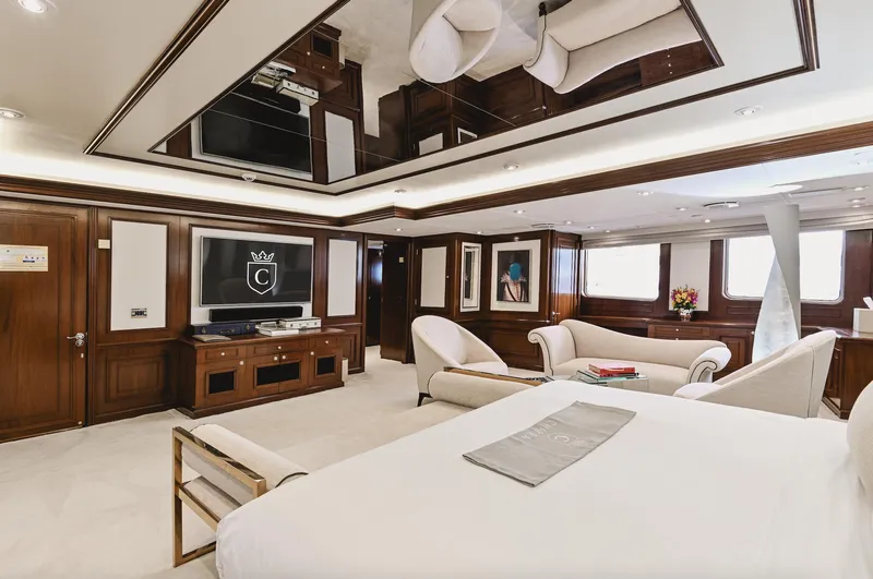 Chakra Yacht Photos Pics Luxurious interior of 1963 Devonport 86m yacht with elegant furnishings and modern entertainment system.