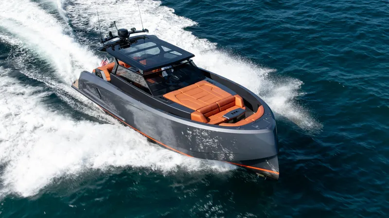 Pharmasea Yacht Photos Pics 2022 Vanquish Yachts VQ45 cruising on open water, showcasing sleek design and luxury features.