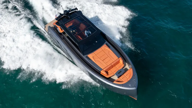 Pharmasea Yacht Photos Pics Luxury 2022 Vanquish Yachts VQ45 cruising on open water, showcasing sleek design and speed.