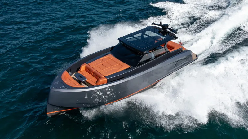 Pharmasea Yacht Photos Pics 2022 Vanquish Yachts VQ45 cruising on open water, featuring sleek design and luxurious seating.