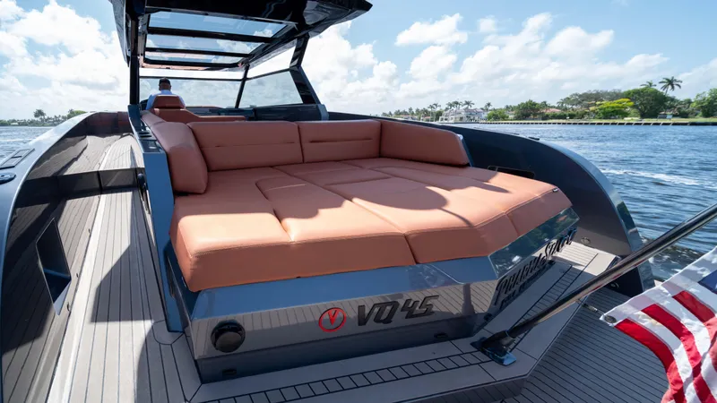 Pharmasea Yacht Photos Pics 2022 Vanquish Yachts VQ45 luxury yacht with spacious sunbed on deck.