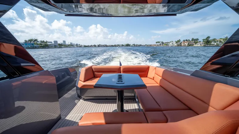 Pharmasea Yacht Photos Pics Luxurious 2022 Vanquish Yachts VQ45 with spacious seating cruising on open water.