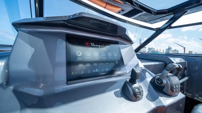 Pharmasea Yacht Photos Pics Control panel of 2022 Vanquish Yachts VQ45, featuring advanced navigation technology.