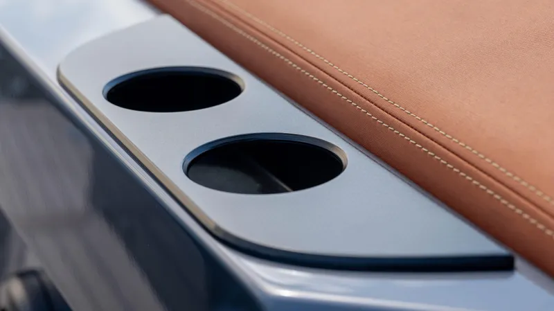 Pharmasea Yacht Photos Pics Cup holders on 2022 Vanquish Yachts VQ45 with brown leather seating.