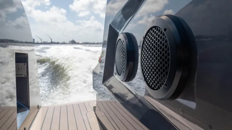 Pharmasea Yacht Photos Pics Vanquish Yachts VQ45 2022, rear view with speakers, cruising on open water.