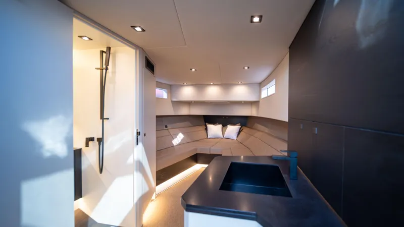 Pharmasea Yacht Photos Pics Luxurious interior of 2022 Vanquish Yachts VQ45, featuring modern design and elegant lighting.