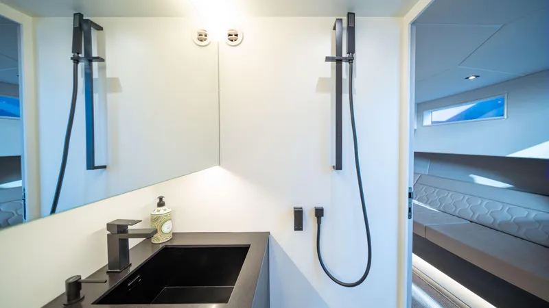 Pharmasea Yacht Photos Pics Modern bathroom interior on 2022 Vanquish Yachts VQ45, featuring sleek fixtures and minimalist design.