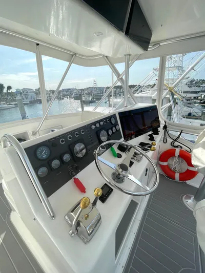 Fish Repellent Yacht Photos Pics 1998 Post 42 Convertible yacht helm with steering wheel and control panel.