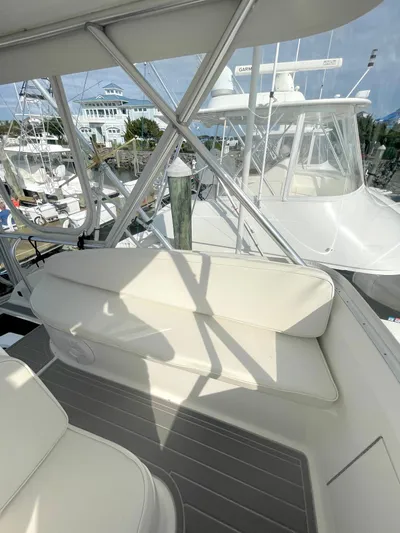 Fish Repellent Yacht Photos Pics 1998 Post 42 Convertible yacht interior with white seating and marina view.