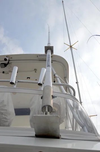 Fish Repellent Yacht Photos Pics 1998 Post 42 Convertible yacht, view of antenna and rigging against cloudy sky.