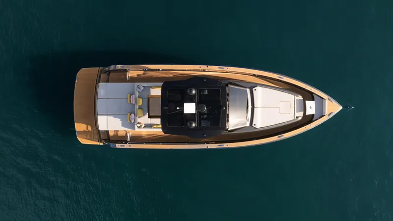 Love$ick Yacht Photos Pics Overhead view of 2023 Pardo Yachts P50 on calm blue water.
