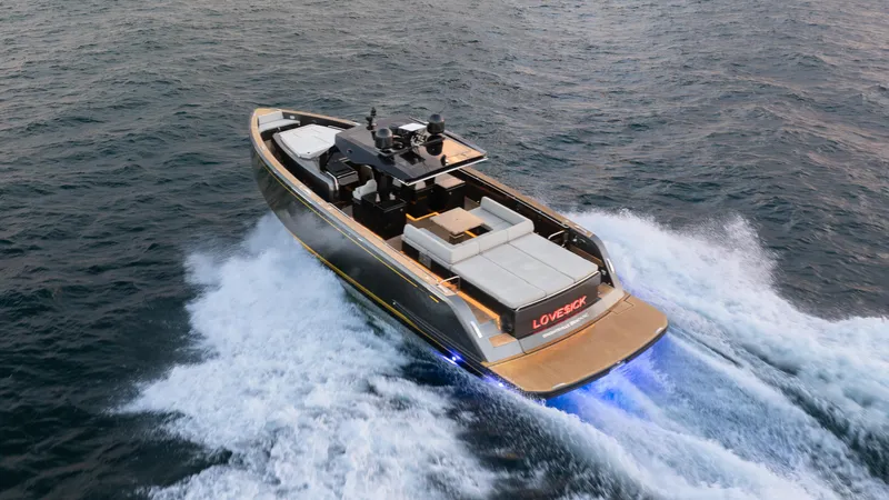 Love$ick Yacht Photos Pics 2023 Pardo Yachts P50 cruising on open water, showcasing sleek design and powerful performance.