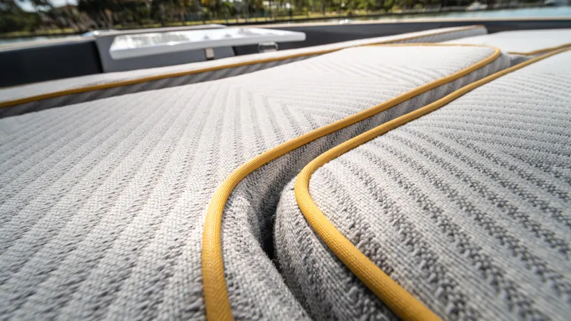 Love$ick Yacht Photos Pics 2023 Pardo Yachts P50 luxury deck cushions with elegant stitching detail.